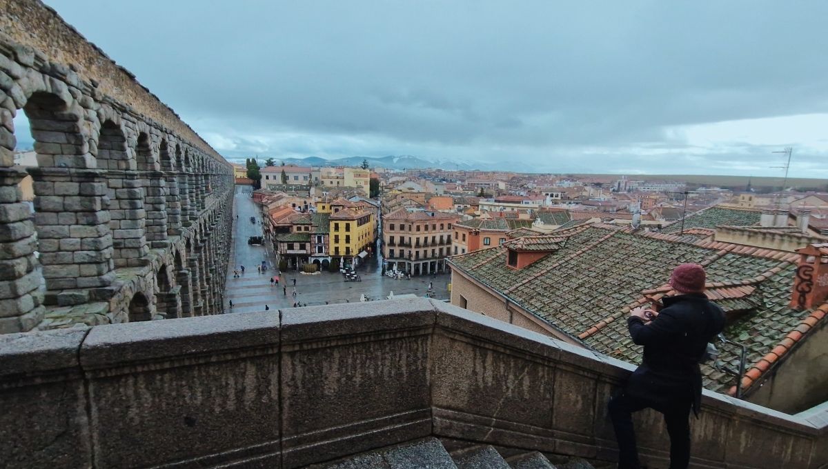 Climbing the steps to the top of the aqueduct
