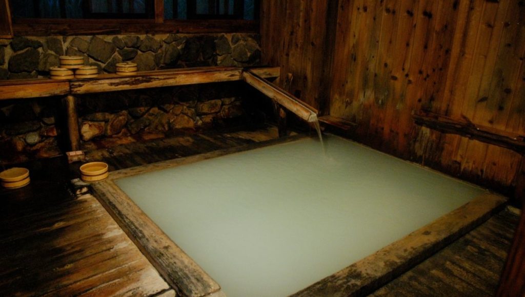 A pool inside a traditional Japanese Onsen
