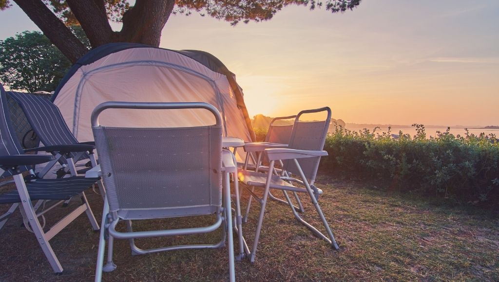 best folding camping table and chairs set in the sunrise in brittany