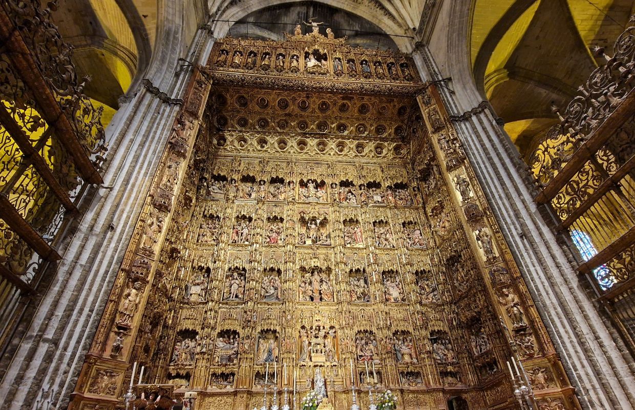 The main Gothic retablo altarpiece in the centre of the Seville Cathedral dripping in gold