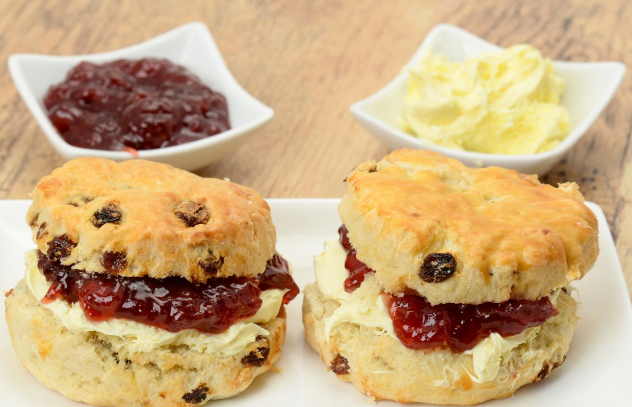 2 scones with clotted cream and jam
