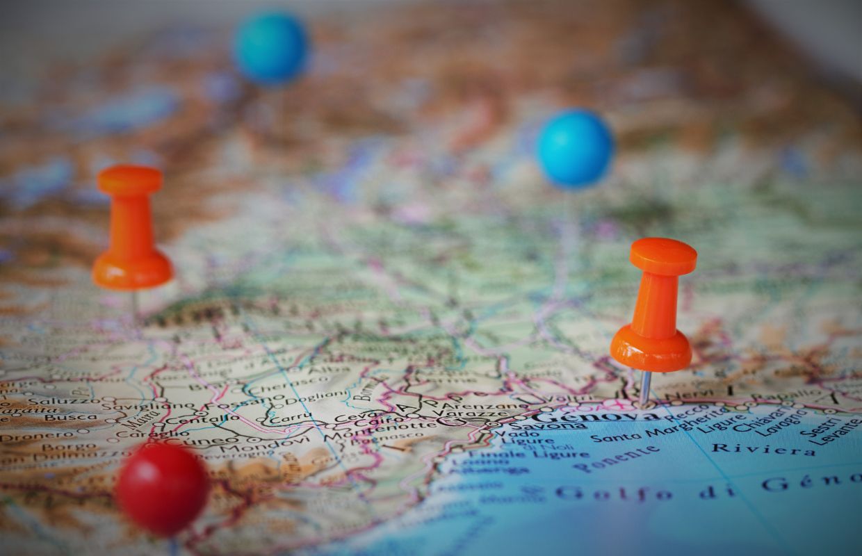Pins in a map for travel inspiration when Choosing A Family Holiday Destination