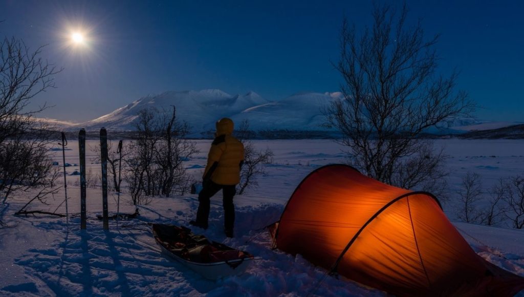how to stay warm when camping in cold weather in a tent on the snow