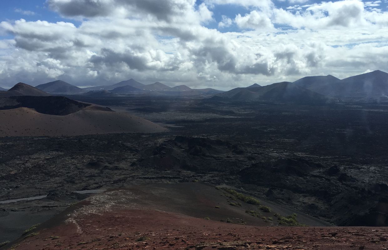 Expansive views across the volcanic Lanzarote landscape.