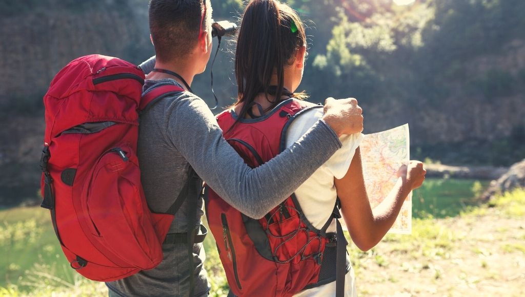 A couple with Venture Pal Backpack and Daypack
