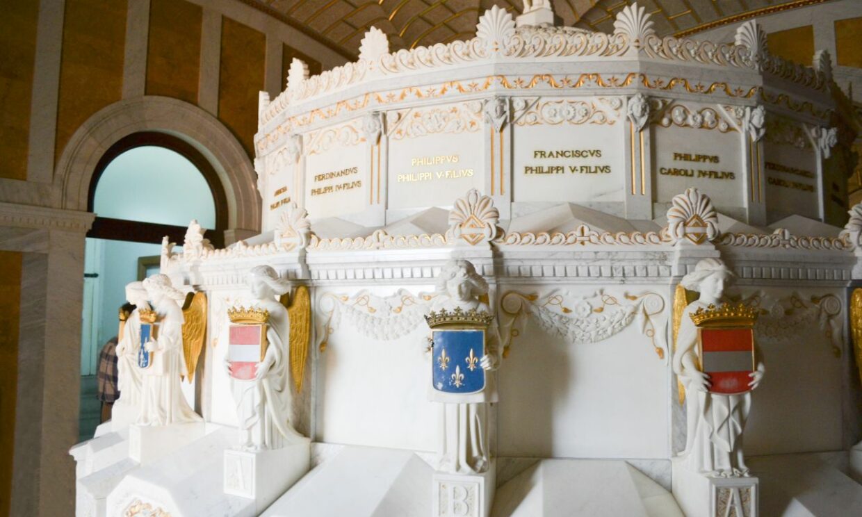 The white marble tombs in the Pantheon of Princes, also known as the Panteón de Infantes