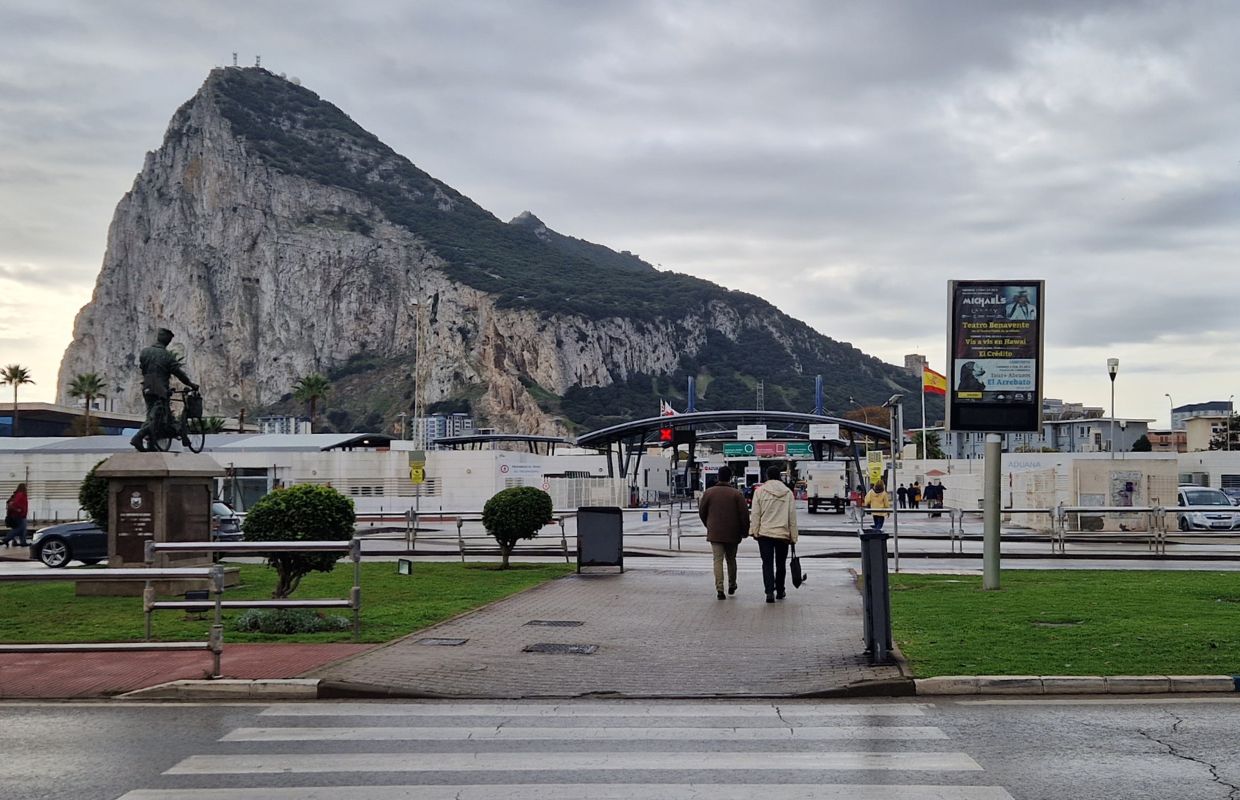 A couple crossing the border into La Linea. Something you will have to do depending on your decision about staying in La Linea de la Concepcion vs Gibraltar