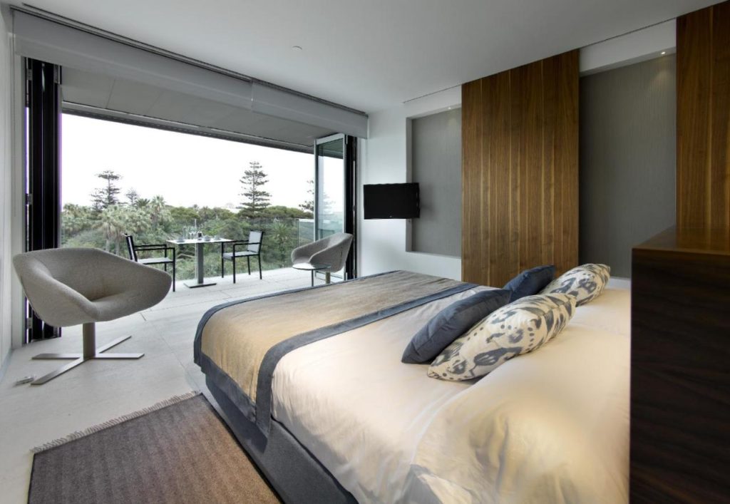 A bedroom with a forest view in the Parador de Cádiz 4 star hotel in Cadiz