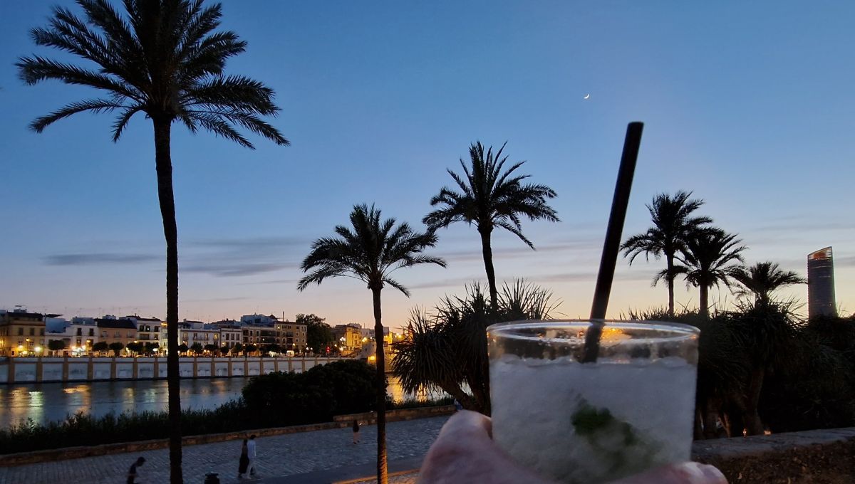 Mojito at sunset in Seville by the river