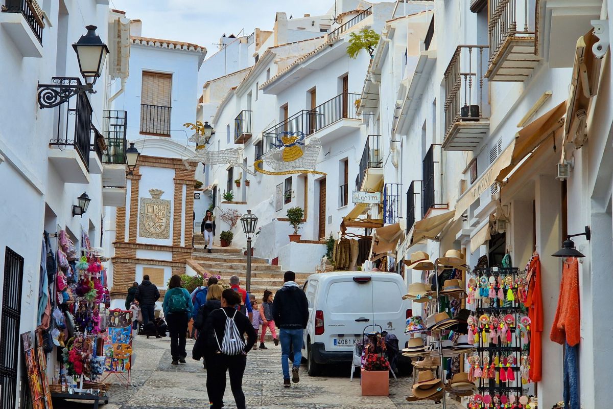 Calle Real, one of the main streets in the Andalusian white village Frigiliana