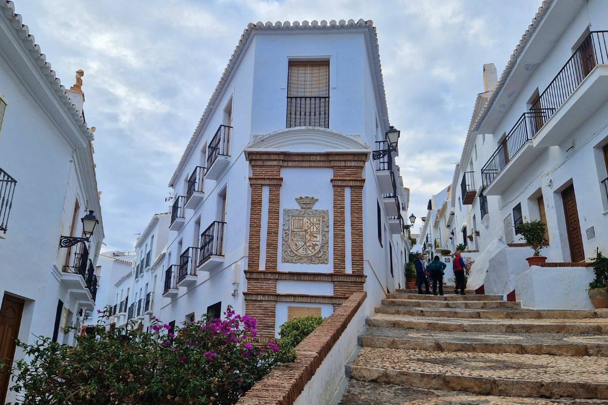 Steps leading up into the mountain streets of the Andalusian white village Frigiliana