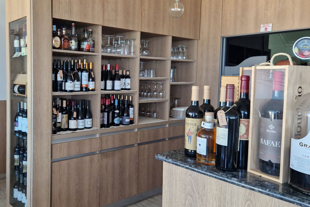 The wine racks inside the restaurant at A Rocha.